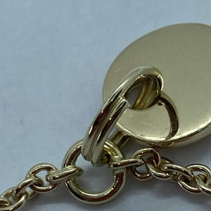 The Secret handmade 14 carat yellow gold chastity key